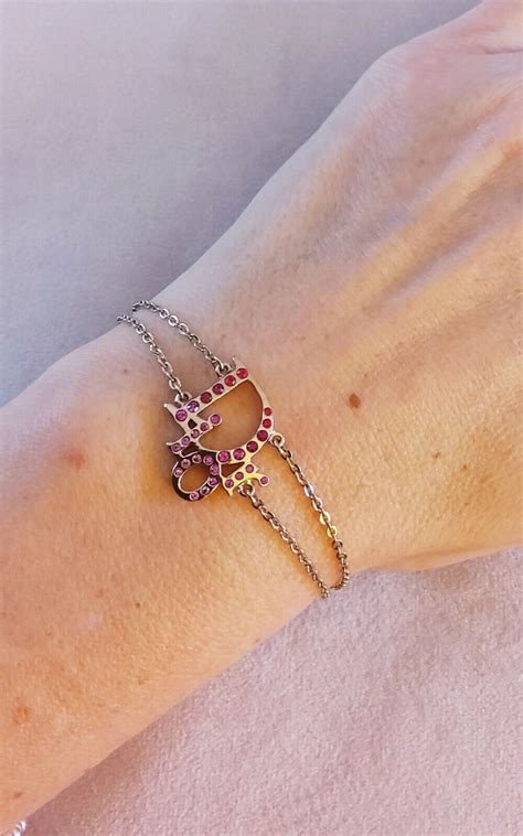 pulsera cristian dior|pulseras de metal rosa.